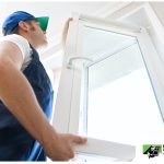 man installing a window