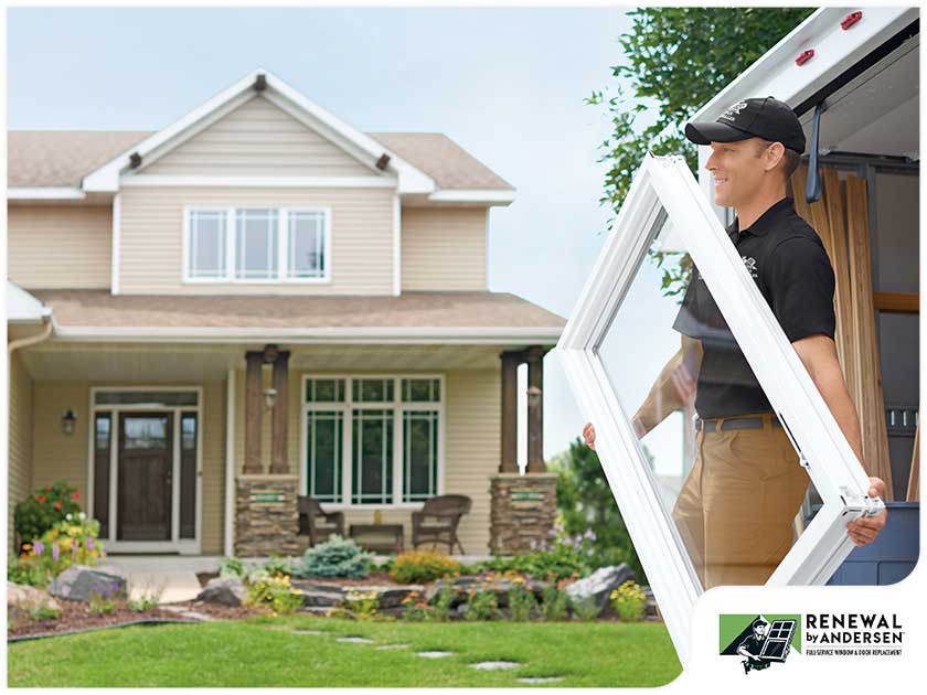 window installer carrying RBA window
